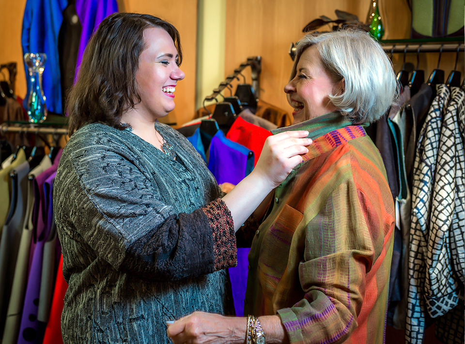 Jadine assists a customer with her signature warmth and humor.